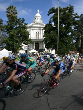 Cyclists racing in front of courthouse