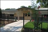 Gated driveway in front of building