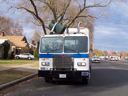 Truck collecting green waste