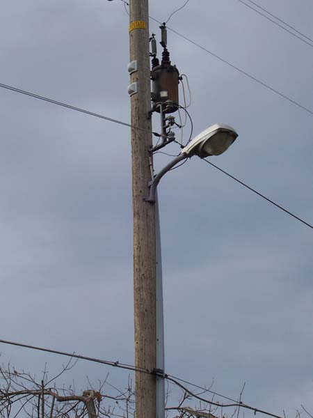 Wooden streetlight pole