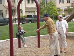 Kid playing on swing